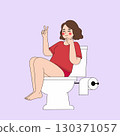 Woman sitting on toilet with thumbs up 130371057
