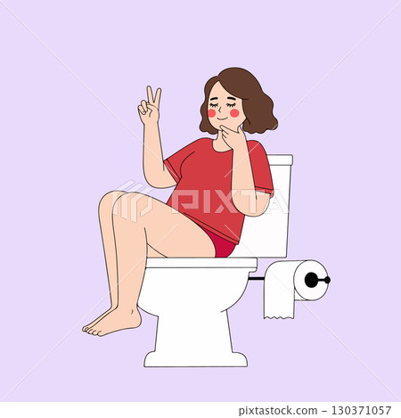 Woman sitting on toilet with thumbs up 130371057