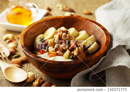 Greek yogurt with plenty of fiber for intestinal health and honey Greek yogurt with plenty of fiber for intestinal health and honey 130371775