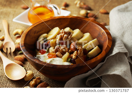 Greek yogurt with plenty of fiber for intestinal health and honey Greek yogurt with plenty of fiber for intestinal health and honey 130371787