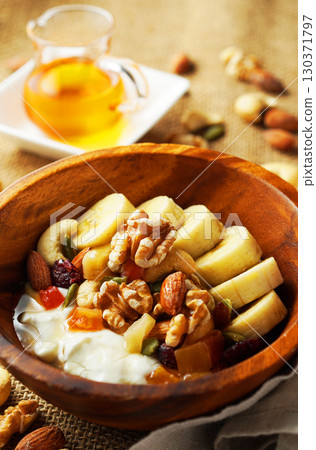 Greek yogurt with plenty of fiber for intestinal health and honey Greek yogurt with plenty of fiber for intestinal health and honey 130371797