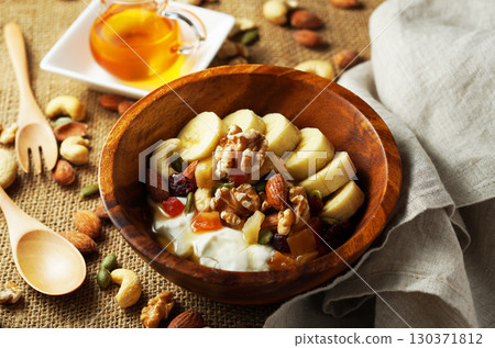 Greek yogurt with plenty of fiber for intestinal health and honey Greek yogurt with plenty of fiber for intestinal health and honey 130371812
