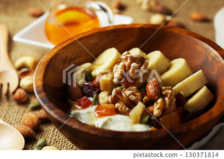 Greek yogurt with plenty of fiber for intestinal health and honey Greek yogurt with plenty of fiber for intestinal health and honey 130371814