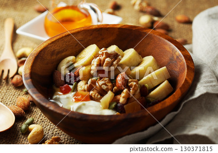 Greek yogurt with plenty of fiber for intestinal health and honey Greek yogurt with plenty of fiber for intestinal health and honey 130371815