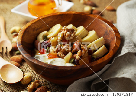 Greek yogurt with plenty of fiber for intestinal health and honey Greek yogurt with plenty of fiber for intestinal health and honey 130371817