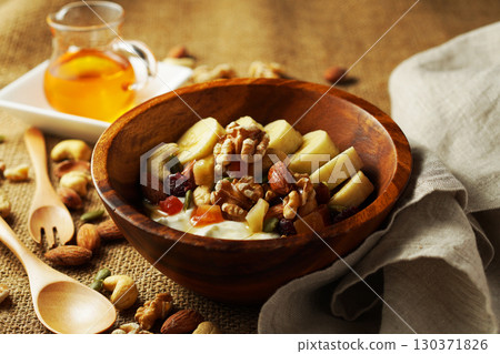 Greek yogurt with plenty of fiber for intestinal health and honey Greek yogurt with plenty of fiber for intestinal health and honey 130371826