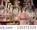 Glasses hanging from the bar ceiling 3 130372339