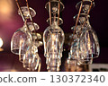Glasses hanging from the bar ceiling 2 130372340