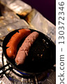 Sausages cooked in a cast iron skillet 130372346