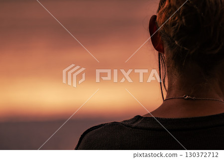 Portrait of a woman from behind 130372712