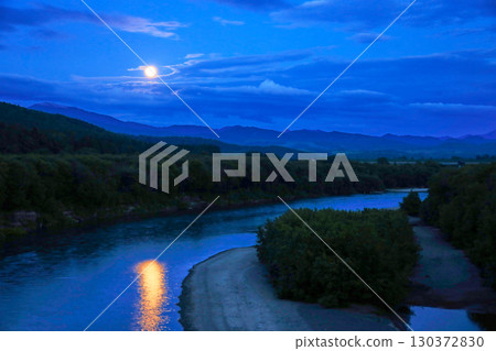 Full moon reflected on the Teshio River 130372830