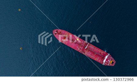 Aerial view crude oil tanker ship at sea, Red crude oil tanker ship top view, Logistic and maritime transpoprtation of petroleum, Modern offshore terminal loading tanker ship. Aerial view crude oil tanker ship at sea, Red crude oil tanker ship top view, Logistic and maritime transpoprtation of petroleum, Modern offshore terminal loading tanker ship. 130372966