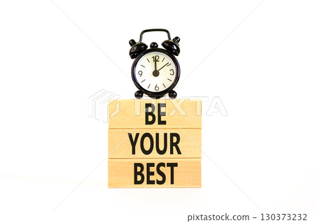Motivational be your best symbol. Concept words Be your best on beautiful wooden blocks. Beautiful white background. Black alarm clock. Business motivational be your best concept. Copy space. 130373232
