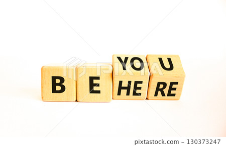 Belonging and belong symbol. Concept words Be here Belong on beautiful wooden block. Beautiful white table white background. Business motivational belonging and belong concept. Copy space. 130373247