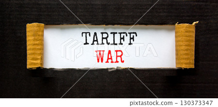 Trade tariff war symbol. Concept word Tariff war on beautiful white paper. Beautiful black paper background. Business trade tariff wars concept. Copy space. Trade tariff war symbol. Concept word Tariff war on beautiful white paper. Beautiful black paper background. Business trade tariff wars concept. Copy space. 130373347