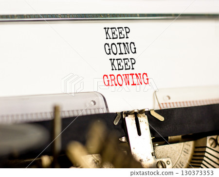 Keep going and growing symbol. Concept words phrase Keep going keep growing typed on beautiful retro old typewriter. Beautiful white background. Business Keep going and growing concept. Copy space. Keep going and growing symbol. Concept words phrase Keep going keep growing typed on beautiful retro old typewriter. Beautiful white background. Business Keep going and growing concept. Copy space. 130373353