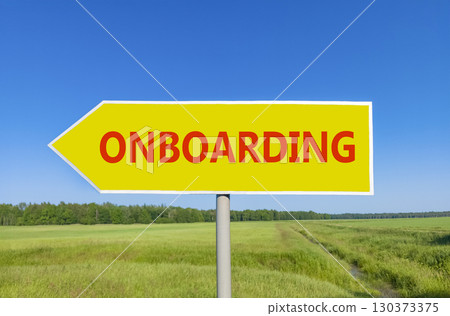 Onboarding success symbol. Concept word Onboarding on beautiful yellow road sign. Beautiful blue sky green grass and forest peaceful nature background. Business onboarding success concept. Copy space. 130373375