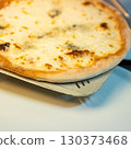 real Neapolitan Italian pizza called margherita pizza just out of the oven 130373468
