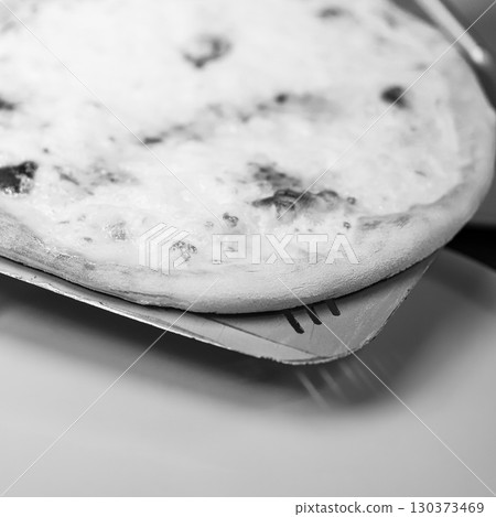 real Neapolitan Italian pizza called margherita pizza just out of the oven real Neapolitan Italian pizza called margherita pizza just out of the oven 130373469