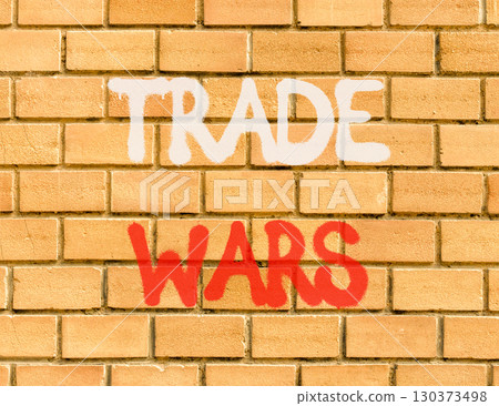 Trade wars symbol. Concept word Trade wars on beautiful brown brick wall. Beautiful brown brick wall background. Brick wall. Business trade wars concept. Copy space. Trade wars symbol. Concept word Trade wars on beautiful brown brick wall. Beautiful brown brick wall background. Brick wall. Business trade wars concept. Copy space. 130373498
