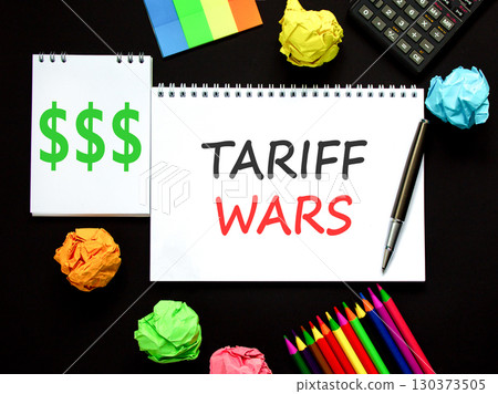 Trade tariff wars symbol. Concept word Tariff wars on beautiful white note. Black calculator. Black pen. Beautiful black paper background. Business trade tariff wars concept. Copy space. 130373505