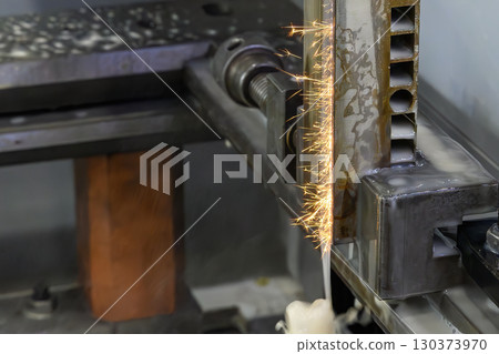 Closeup scene the wire EDM machine cutting the mold insert parts. 130373970