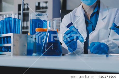 Collaboration, tablet or science with people in lab together for research or development. Innovation, tech and microscope with scientist team in clinical trial for planning or medical investigation 130374509