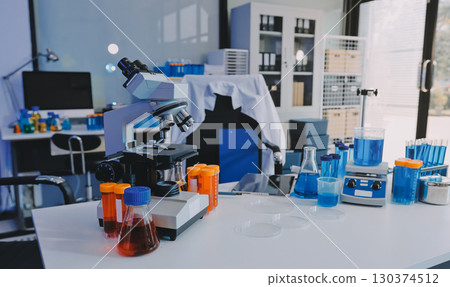 Collaboration, tablet or science with people in lab together for research or development. Innovation, tech and microscope with scientist team in clinical trial for planning or medical investigation 130374512