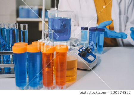 Collaboration, tablet or science with people in lab together for research or development. Innovation, tech and microscope with scientist team in clinical trial for planning or medical investigation 130374532
