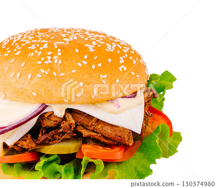 Delicious sesame seed bun filled with fresh vegetables and grilled meat Delicious sesame seed bun filled with fresh vegetables and grilled meat 130374980