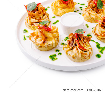 Gourmet dish served stylishly at a fine dining restaurant Gourmet dish served stylishly at a fine dining restaurant 130375060