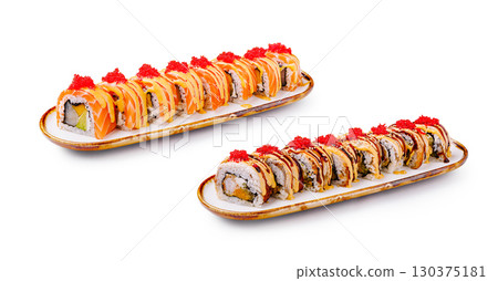 Delicious sushi rolls artfully arranged on elegant platters Delicious sushi rolls artfully arranged on elegant platters 130375181