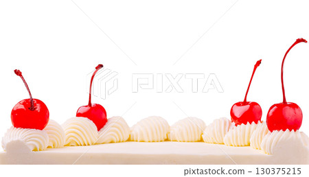 Whipped cream and cherries decorate a dessert with elegance 130375215