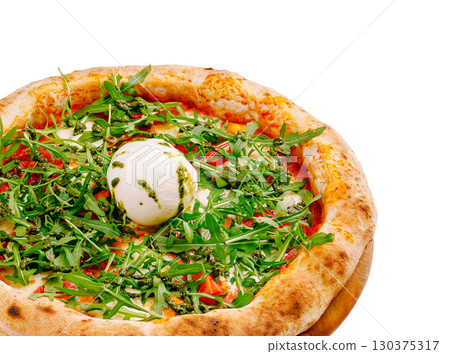 Freshly made pizza topped with arugula and creamy cheese on a wooden table Freshly made pizza topped with arugula and creamy cheese on a wooden table 130375317
