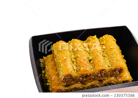 Delicious Turkish baklava with pistachios in a black box 130375386