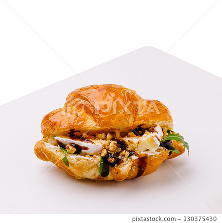 Unique croissant sandwich with fresh ingredients and rich flavors Unique croissant sandwich with fresh ingredients and rich flavors 130375430