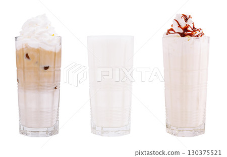 Refreshing summer drinks served in tall glasses with whipped cream 130375521