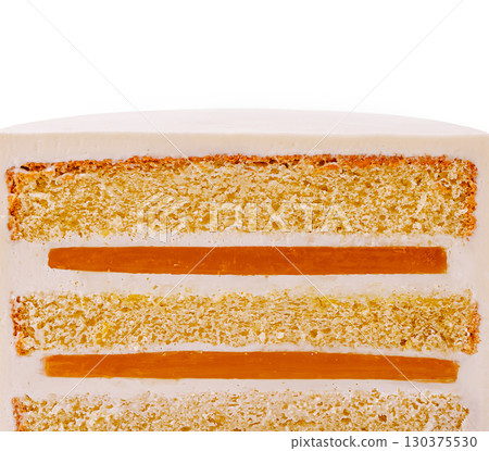 Layered cake with frosting and caramel on a white background Layered cake with frosting and caramel on a white background 130375530