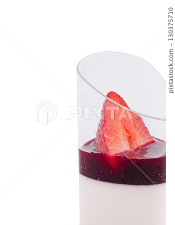 Delicious dessert with creamy layer and fresh strawberry topping Delicious dessert with creamy layer and fresh strawberry topping 130375710