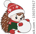 Christmas hedgehog enjoying snowball toss in seasonal setting. 130375917