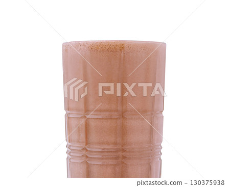 Creamy chocolate drink served in a tall glass with frothy top 130375938