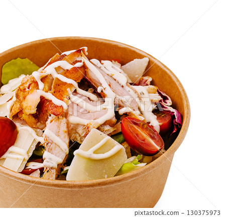 Healthy chicken salad with fresh ingredients in a compostable bowl Healthy chicken salad with fresh ingredients in a compostable bowl 130375973