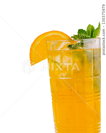 Refreshing citrus drink with mint garnish served in a tall glass Refreshing citrus drink with mint garnish served in a tall glass 130375979