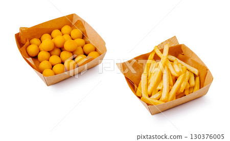 Golden cheese balls and crispy French fries served in paper trays 130376005