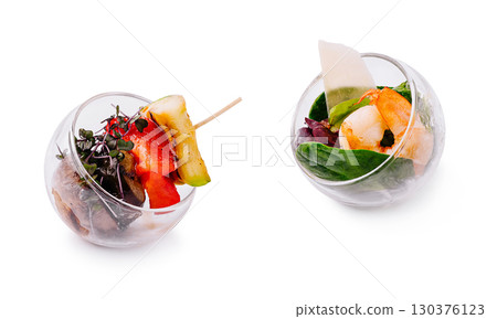 Colorful salad creations served in glass bowls at a culinary event in autumn 130376123