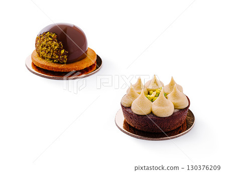Delicious gourmet pastries featuring chocolate and pistachio delights 130376209