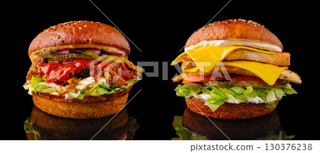 Delicious sandwich selection showcasing pulled meat and cheesy toppings 130376238