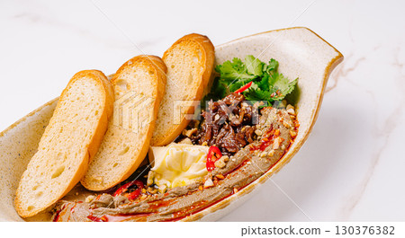 Liver pate with caramelized onion and toasted bread 130376382