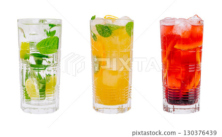 Refreshing summer drinks served in tall glasses with ice and garnishes Refreshing summer drinks served in tall glasses with ice and garnishes 130376439