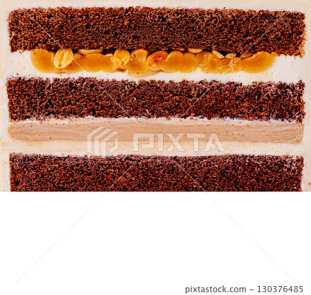 Rich chocolate cake layered with creamy filling and nuts for dessert lovers 130376485